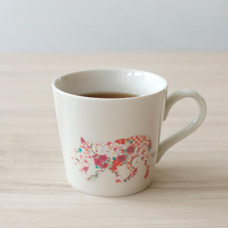 【マグカップ】温感 くわえる猫 (ニューボン) | 美濃焼 | 丸モ高木陶器