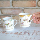 【磁器】大倉陶園 「うまくゆく 回転木馬」イエロー マグカップ